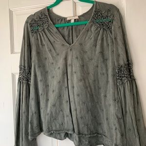 Women’s green blouse with bell sleeves
